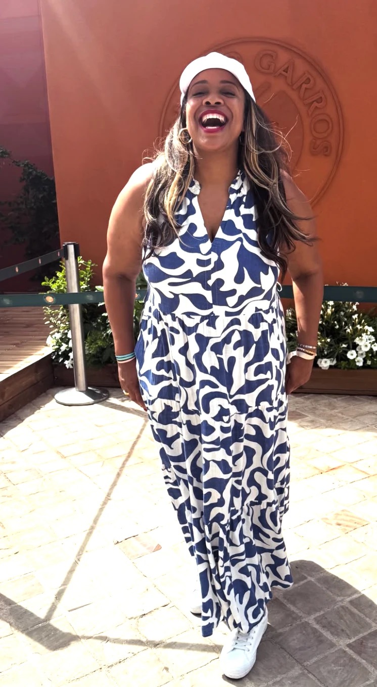 Claire B. Soares laughing at Roland Garros, the home of the French Open